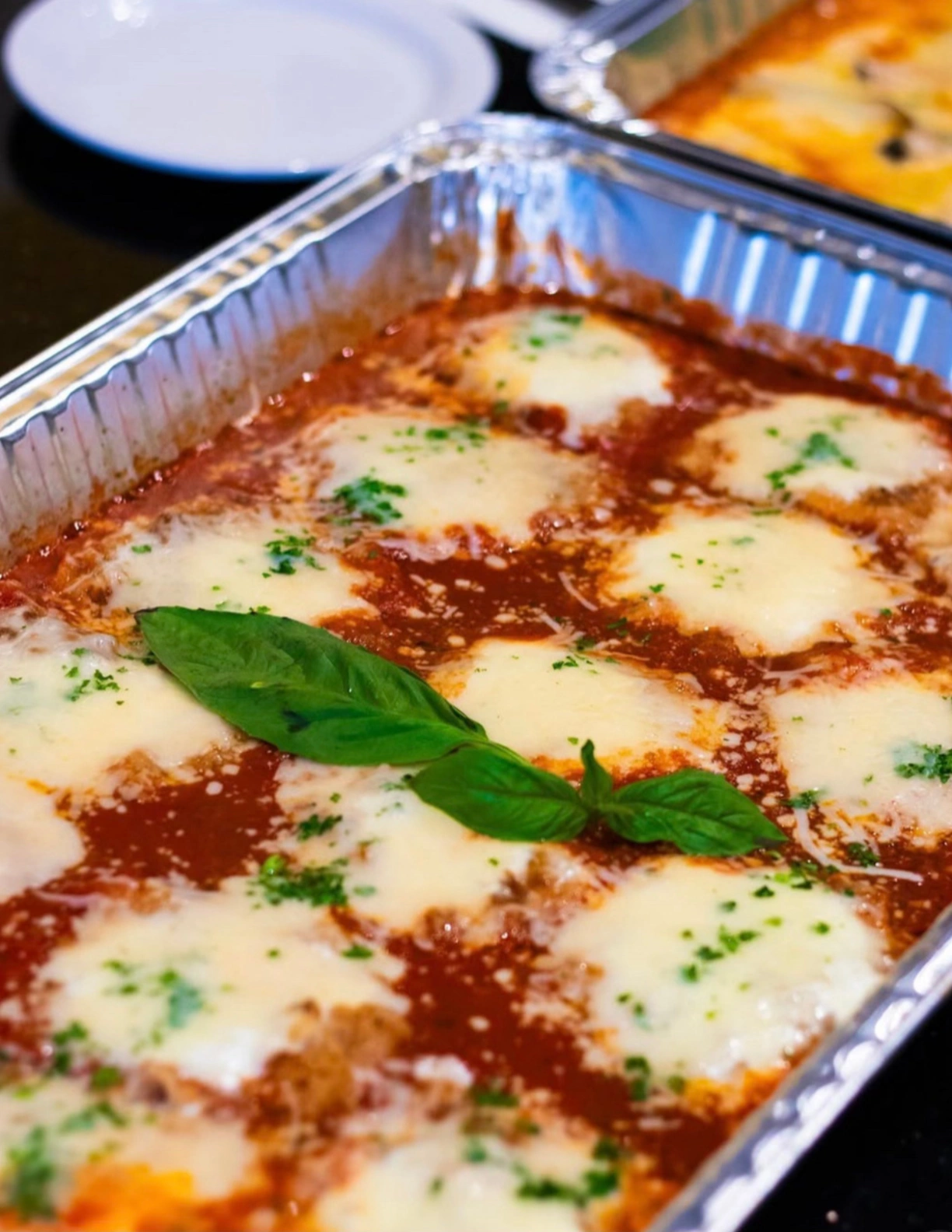 red sauce with lots of cheese on thee top
